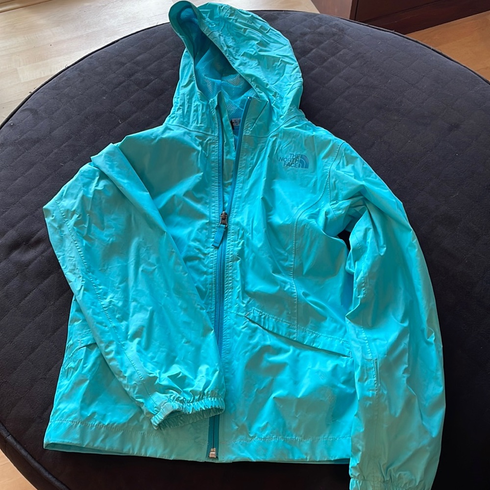 North Face girls rain coat. Size medium (10/12). Color aqua.